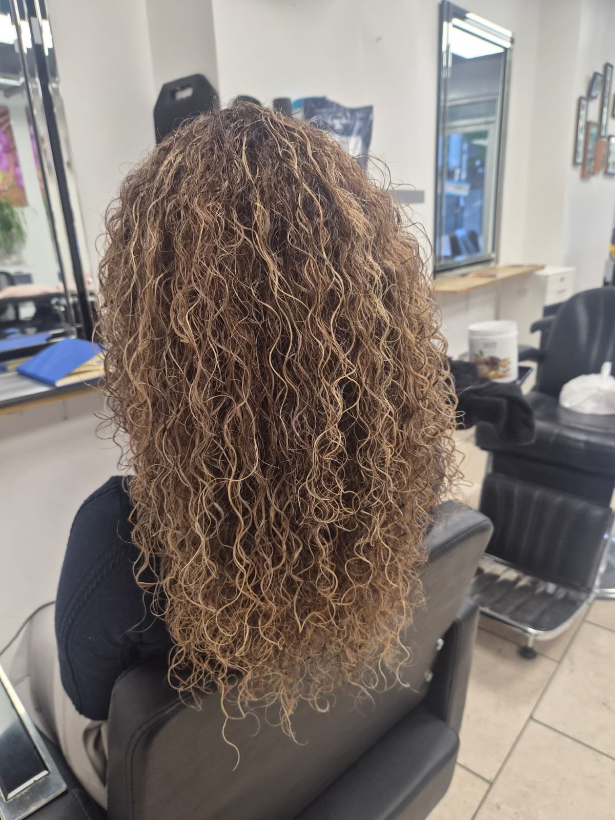 Curly balayage hairstyle